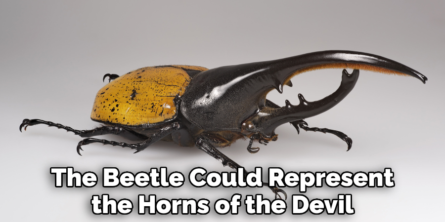 The Beetle Could Represent the Horns of the Devil